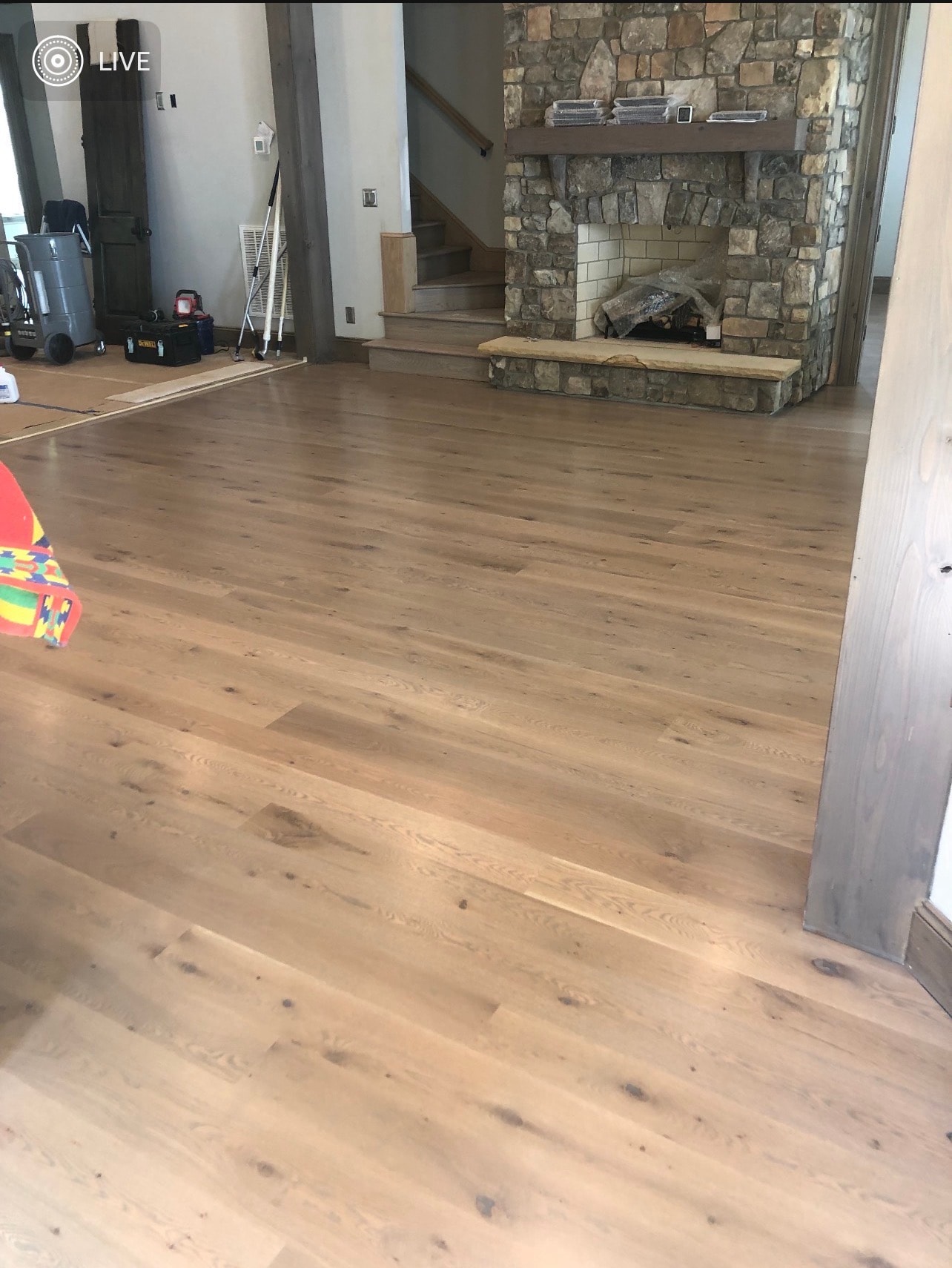 8-inch wide unfinished White Oak hardwood flooring installed in living room – Elegant Floors NC