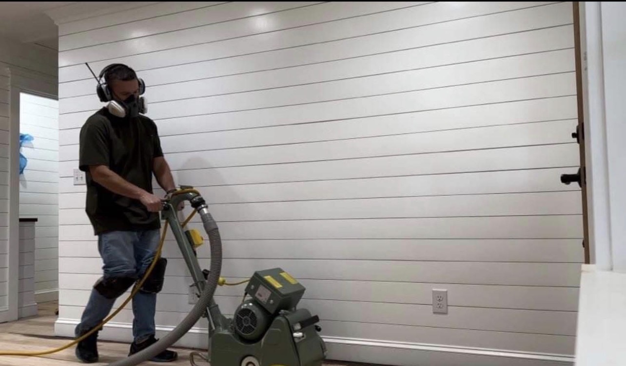 Professional floor sanding with dust containment system